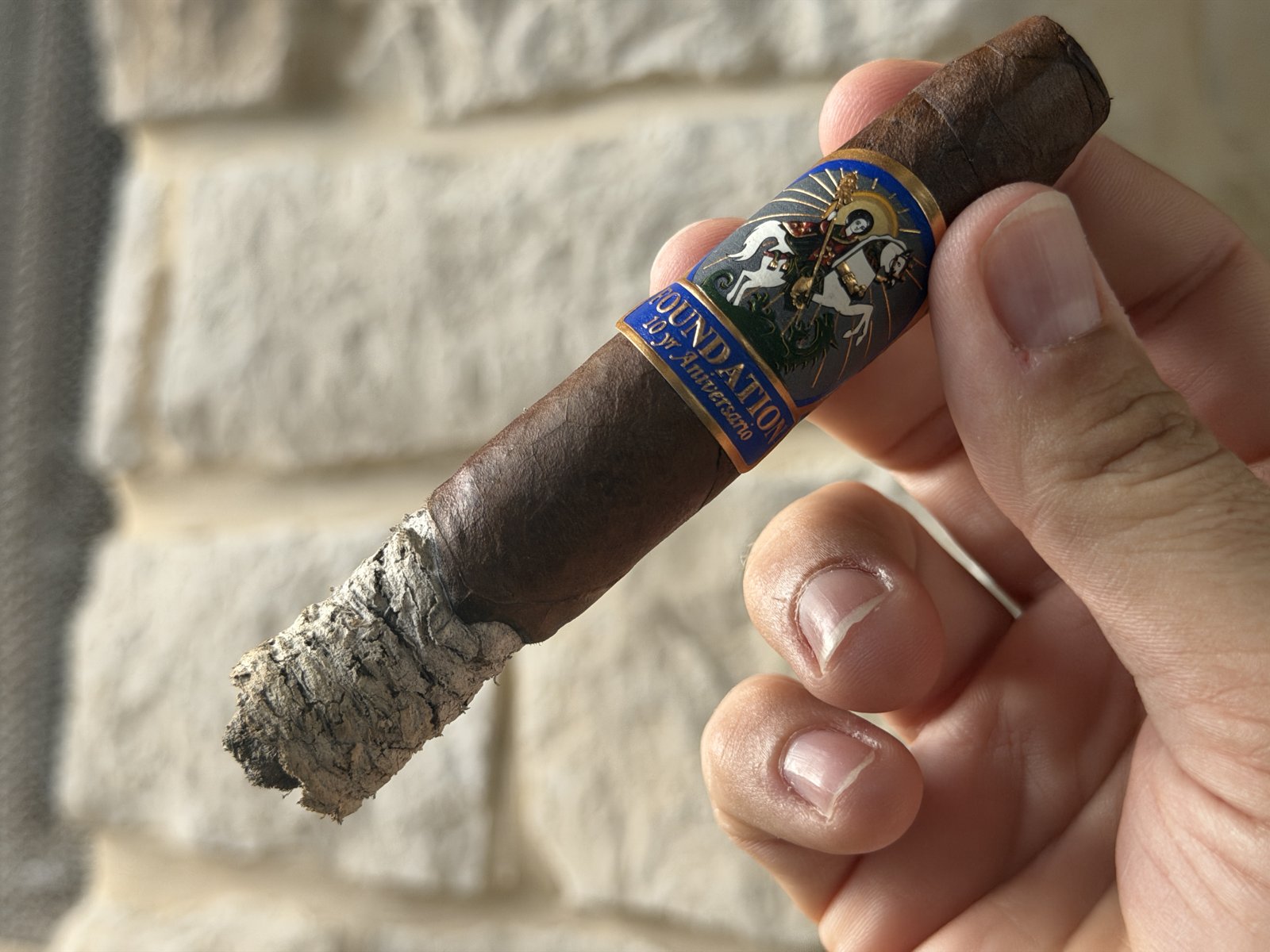 Foundation 10 Year Aniversario in the second third with a long stack of grey ash still attached