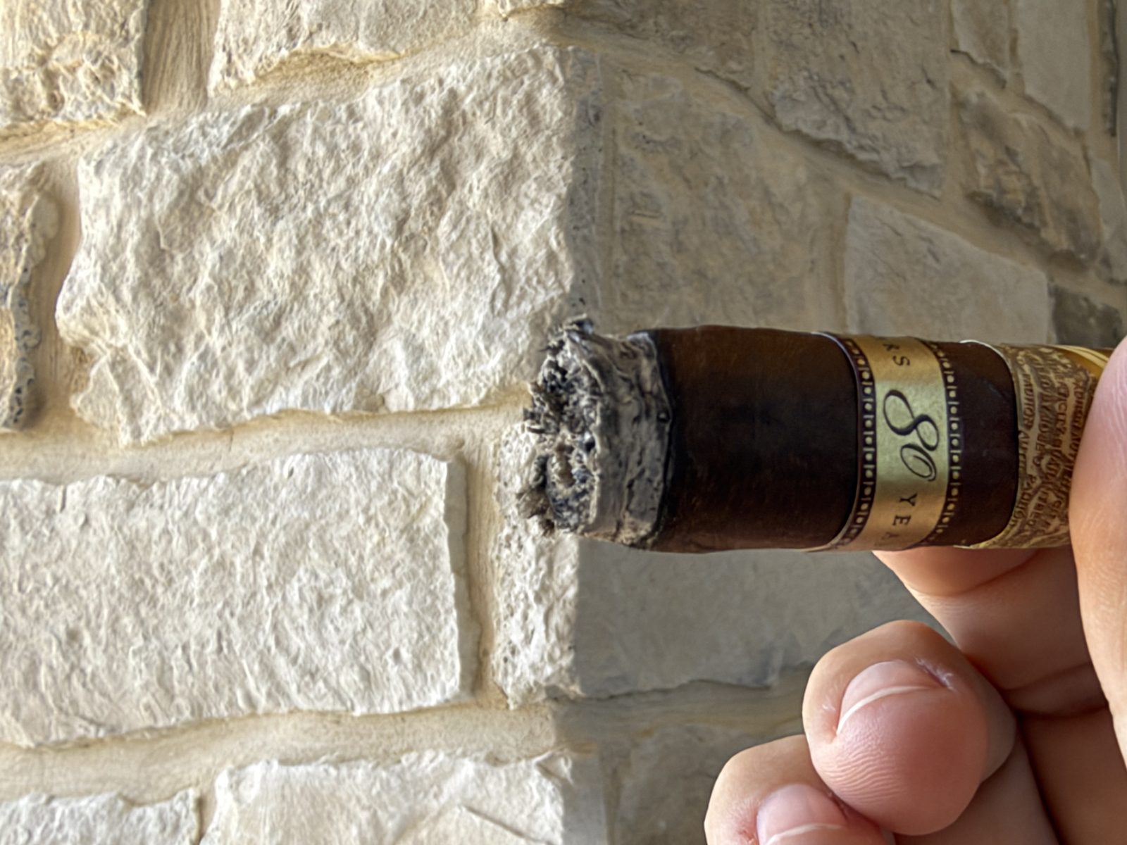 Padrón 1926 Serie 80 Years Maduro after the second ash, foot burned flat straight across with no ligero point