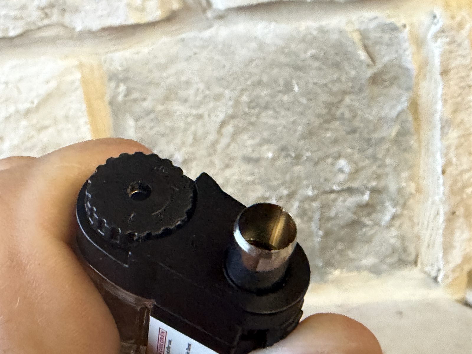 Bottom of the Rockwell quad torch showing the fuel adjustment dial and small punch cutter