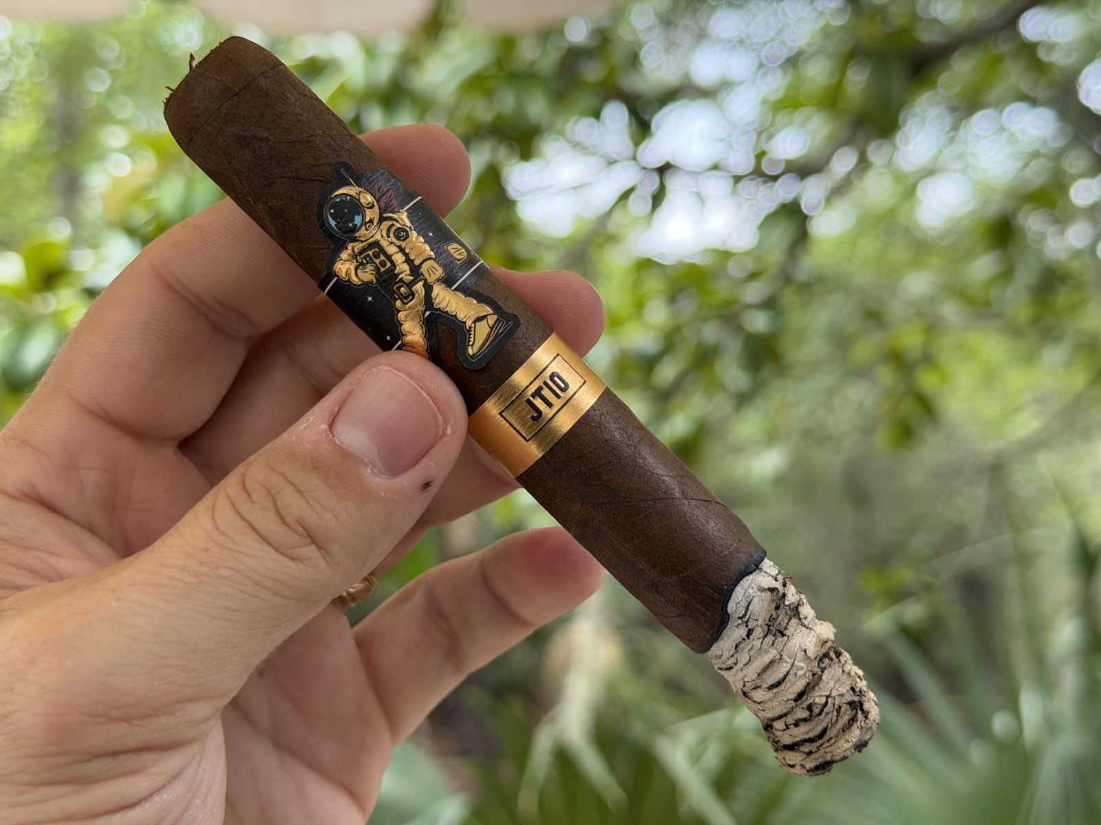 Room101 JT10 with a long stacked white ash in the first third, astronaut band still on